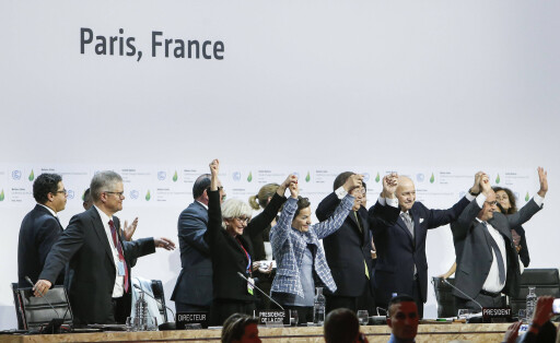 (151212) -- PARIS, Dec. 12, 2015 -- French Foreign Minister and President of the COP21 Laurent Fabius (3rd R), United Nations Secretary-General Ban Ki-moon (4th R), French President Francois Hollande (2nd R) and Christiana Figueres (5th R), executive secretary of the UN Framework Convention on Climate Change (UNFCCC) celebrate the adoption of the agreement during the final conference at the COP21, in Le Bourget, Paris, Dec.12, 2015. The historic Paris agreement on climate change is finally adopted with no objection on Saturday